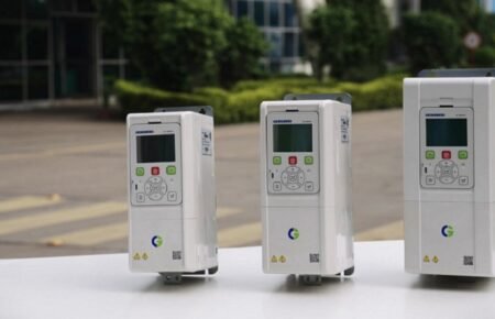 CG Power and Industrial Solutions has expanded its industrial automation portfolio with the AMX Series, a new range of AC drives aimed at applications where motor control has to deliver more than basic speed regulation. The range is designed for both induction and permanent-magnet motors and combines V/F and field-oriented control (FOC). The focus is practical: higher starting torque, responsive control at low frequencies and stable operation under demanding loads. The drives cover 1.5 kW to 55 kW in three-phase, 230-480 V configurations and are manufactured at CG’s Mandideep facility in Madhya Pradesh. What makes the AMX range notable is the amount of functionality built into the drive itself. Load monitoring, timers, counters and virtual I/Os can support application logic without additional hardware, while an integrated oscilloscope gives maintenance and engineering teams a way to examine drive behaviour and waveforms during operation. CG has also designed the series for harsh industrial environments. The drives use conformal coating and are rated for operation at ambient temperatures up to 50°C without derating. Braking functions include an integrated brake chopper on models up to 45 kW, alongside vector braking for controlled stopping. An energy-saving function can also reduce unnecessary motor operation. The launch also fits CG’s broader push into industrial drives and automation. Company management has previously described its low-voltage drive portfolio as largely indigenous, signalling an effort to build deeper domestic capability in a segment increasingly important to Indian manufacturing.