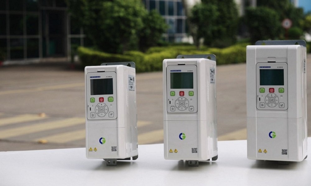 CG Power and Industrial Solutions has expanded its industrial automation portfolio with the AMX Series, a new range of AC drives aimed at applications where motor control has to deliver more than basic speed regulation. The range is designed for both induction and permanent-magnet motors and combines V/F and field-oriented control (FOC). The focus is practical: higher starting torque, responsive control at low frequencies and stable operation under demanding loads. The drives cover 1.5 kW to 55 kW in three-phase, 230-480 V configurations and are manufactured at CG’s Mandideep facility in Madhya Pradesh. What makes the AMX range notable is the amount of functionality built into the drive itself. Load monitoring, timers, counters and virtual I/Os can support application logic without additional hardware, while an integrated oscilloscope gives maintenance and engineering teams a way to examine drive behaviour and waveforms during operation. CG has also designed the series for harsh industrial environments. The drives use conformal coating and are rated for operation at ambient temperatures up to 50°C without derating. Braking functions include an integrated brake chopper on models up to 45 kW, alongside vector braking for controlled stopping. An energy-saving function can also reduce unnecessary motor operation. The launch also fits CG’s broader push into industrial drives and automation. Company management has previously described its low-voltage drive portfolio as largely indigenous, signalling an effort to build deeper domestic capability in a segment increasingly important to Indian manufacturing.